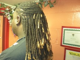Woman - Style your hair with haircuts, hair straightening, and dreadlock hairstyles at our Clayton, North Carolina, hair salon.